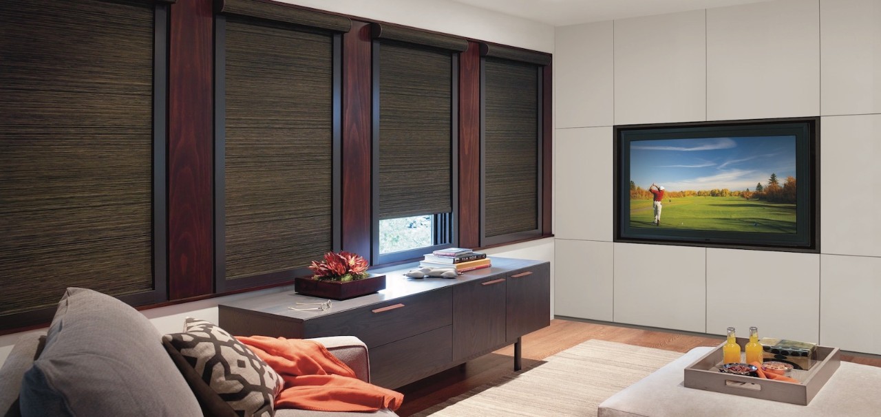 A media room with built-in TV and hidden cables.